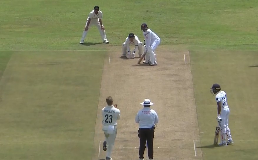 Sneaky! Phillips breaks through bat and pad of the Lankan skipper