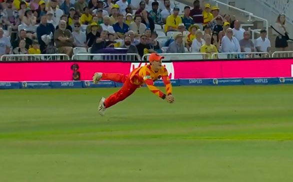 poster url for GRAVITY-DEFYING! Jacob Bethell's stunning dive catch to dismiss Powell